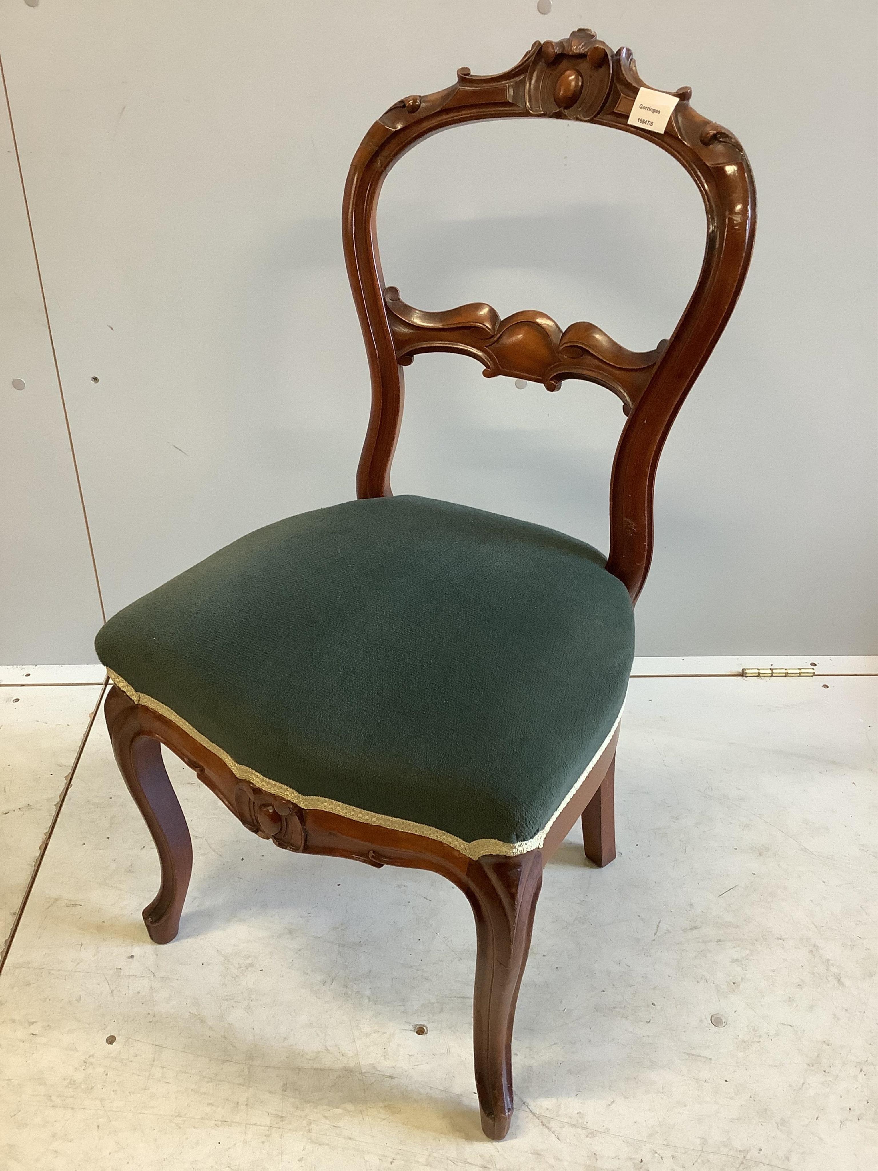 A pair of Victorian mahogany dining chairs, on fluted legs, another on cabriole legs and a Chippendale style chair, with a drop in tapestry seat. Condition - fair